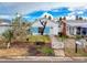 Charming home with white picket fence and a well-maintained front yard at 336 Boca Ciega Dr, Madeira Beach, FL 33708