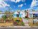 Exterior of a cozy home featuring a quaint front yard and white picket fence at 336 Boca Ciega Dr, Madeira Beach, FL 33708