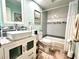 Well-lit bathroom featuring a modern vanity with sink and a tub/shower combination at 3447 Paloma Dr, Holiday, FL 34690