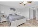 Cozy bedroom with decorative headboard and side tables at 3701 Corsair Ct, New Port Richey, FL 34652