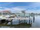 The boat lift makes it easy to get your boat in and out of the water for all your boating adventures at 3701 Corsair Ct, New Port Richey, FL 34652