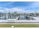 Private boat lift and dock with waterfront access in a canal community at 3701 Corsair Ct, New Port Richey, FL 34652