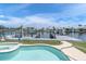 Enjoy waterfront living with a private pool and dock with boat lift overlooking a serene canal at 3701 Corsair Ct, New Port Richey, FL 34652