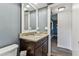 Bathroom featuring granite vanity with updated fixtures at 3745 Teeside Dr # 3745, New Port Richey, FL 34655