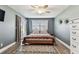 Bright bedroom with a sliding glass door and neutral tones at 3745 Teeside Dr # 3745, New Port Richey, FL 34655