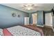 Serene bedroom with a ceiling fan and ample natural light at 3745 Teeside Dr # 3745, New Port Richey, FL 34655