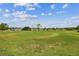 Scenic view of the lush green golf course on a sunny day at 3745 Teeside Dr # 3745, New Port Richey, FL 34655