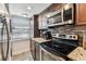 Updated kitchen featuring stainless steel appliances and granite countertops at 3745 Teeside Dr # 3745, New Port Richey, FL 34655