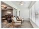 Relaxing lanai featuring comfortable chairs and views into the living room at 3745 Teeside Dr # 3745, New Port Richey, FL 34655