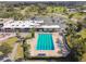 An aerial view of a community pool surrounded by lounge chairs and manicured landscaping at 3745 Teeside Dr # 3745, New Port Richey, FL 34655