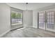 Bedroom featuring a modern ceiling fan and ample natural light from a large window at 4360 Talco Ave, Spring Hill, FL 34609