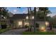 The exterior of the house is well-lit and inviting, perfect for anyone looking for a cozy home at 4439 Reeves Rd, New Port Richey, FL 34652