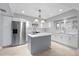 Bright, open kitchen featuring stainless steel appliances and island at 4439 Reeves Rd, New Port Richey, FL 34652