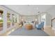 Cozy living room with plenty of natural light and comfortable seating at 4439 Reeves Rd, New Port Richey, FL 34652