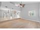 Open floor plan with sleek tile flooring and tons of natural light at 4439 Reeves Rd, New Port Richey, FL 34652