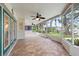 Large screened in patio with brick pavers offering a serene space for relaxation and outdoor enjoyment at 4439 Reeves Rd, New Port Richey, FL 34652