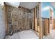 Bright bathroom featuring tiled floors, insulation, and partially renovated walls at 4543 Dewey Dr, New Port Richey, FL 34652