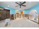 Bright bathroom featuring tiled floors, sink, and partially renovated walls at 4543 Dewey Dr, New Port Richey, FL 34652