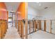 Bright hallway featuring tiled floors and partially renovated walls at 4543 Dewey Dr, New Port Richey, FL 34652