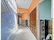 Renovation project with orange walls and exposed framework, tiled floor at 4543 Dewey Dr, New Port Richey, FL 34652