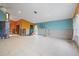 Living space under construction with colorful accent walls and tiled floors at 4543 Dewey Dr, New Port Richey, FL 34652