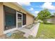 A view of the screened-in entryway and walkway on the side of the home at 4543 Dewey Dr, New Port Richey, FL 34652