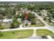 Aerial view of a quaint neighborhood showcasing lush greenery and the home's location in a desirable community at 4622 Paloverde Dr, New Port Richey, FL 34652