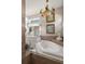 A stunning bathroom with a jacuzzi tub and a double sink vanity at 5072 Abbonmarsh Cir, Brooksville, FL 34604