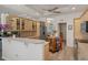 Beautiful kitchen with granite countertops, modern appliances, and a breakfast bar at 5072 Abbonmarsh Cir, Brooksville, FL 34604