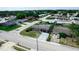 Bird's-eye view of a neighborhood showcasing tree-lined streets and well-maintained homes at 5543 Moog Rd, New Port Richey, FL 34652