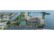Beautiful waterfront complex with private boat docks, lush landscaping, and resort-style amenities at 6035 Sea Ranch Dr # 410, Hudson, FL 34667