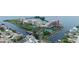 Expansive waterfront complex featuring tennis courts, boat docks, and a stunning coastal setting at 6035 Sea Ranch Dr # 410, Hudson, FL 34667