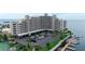 Beautiful waterfront condo building with ample parking, boat docks, and well-maintained landscaping at 6035 Sea Ranch Dr # 410, Hudson, FL 34667