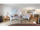 Spacious living room seamlessly flows into the kitchen, creating an open and airy space perfect for relaxing at 6035 Sea Ranch Dr # 410, Hudson, FL 34667