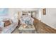 Inviting living room seamlessly flows into the kitchen, creating an open and airy space perfect for relaxing at 6035 Sea Ranch Dr # 410, Hudson, FL 34667