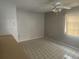 Bright dining room with neutral walls, tile flooring, and a ceiling fan at 7338 Foxbloom Dr, Port Richey, FL 34668