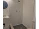 Shower featuring tiled walls and floor at 8504 Lafitte Dr, Hudson, FL 34667