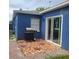 Relax on this patio with grill, and access to the home through sliding glass doors at 8504 Lafitte Dr, Hudson, FL 34667