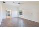 Bright bedroom with tile flooring and access to the en-suite bathroom at 8522 Cranes Roost Dr, New Port Richey, FL 34654