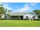 Charming single story home with a well manicured lawn, tasteful shrubbery and stone accents at 8522 Cranes Roost Dr, New Port Richey, FL 34654