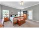 Comfortable bedroom with neutral colors and natural lighting from the windows at 9309 Edistro Pl, New Port Richey, FL 34654