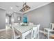 Bright dining area with open space and dining set at 9309 Edistro Pl, New Port Richey, FL 34654