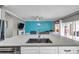 Bright, open floor plan features a spacious kitchen that flows seamlessly into the living area at 9309 Edistro Pl, New Port Richey, FL 34654