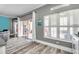 Spacious living room with sliding doors to the outside at 9309 Edistro Pl, New Port Richey, FL 34654