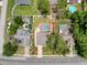 An overhead perspective displays the homes backyard featuring a pool, landscaping, and spacious backyard at 9431 Spring Hill Dr, Spring Hill, FL 34608
