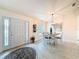 Bright dining area with a view of the front door at 9431 Spring Hill Dr, Spring Hill, FL 34608