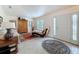 Comfortable living room featuring natural light and stylish furniture at 9431 Spring Hill Dr, Spring Hill, FL 34608