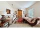 Comfortable living room featuring natural light and stylish furniture at 9431 Spring Hill Dr, Spring Hill, FL 34608