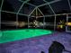 Screened pool boasts lights, privacy, patio and landscaping at 9431 Spring Hill Dr, Spring Hill, FL 34608