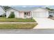 Charming single-story home with well-maintained lawn and a combination brick and painted facade at 9433 Stonewall Ln, New Port Richey, FL 34655